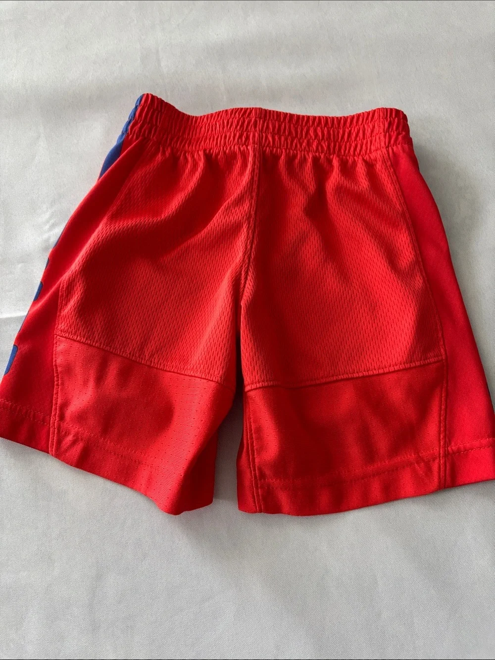 Nike Red Kids Athletic Shorts with Blue Logo and Side Panels size XS